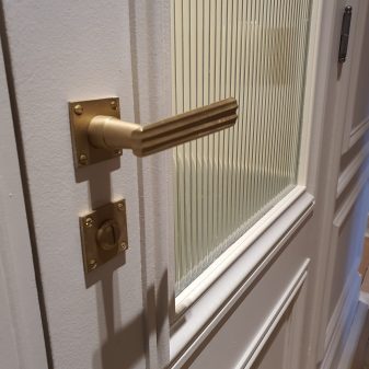 poignée de porte art déco axe menuiserie